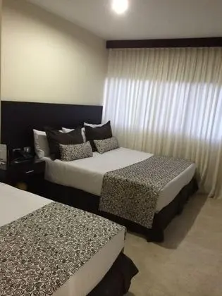 Standard Tek Büyük Yataklı Oda (2 camas 2 adultos + 1 niño)