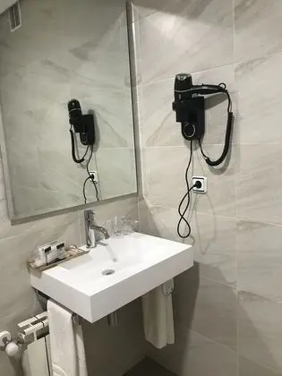 Basic Tek Büyük veya İki Ayrı Yataklı Oda