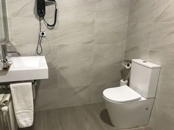 Basic Tek Büyük veya İki Ayrı Yataklı Oda