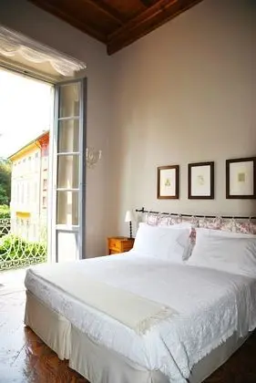 Tek Büyük veya İki Ayrı Yataklı Oda, Bahçe Manzaralı