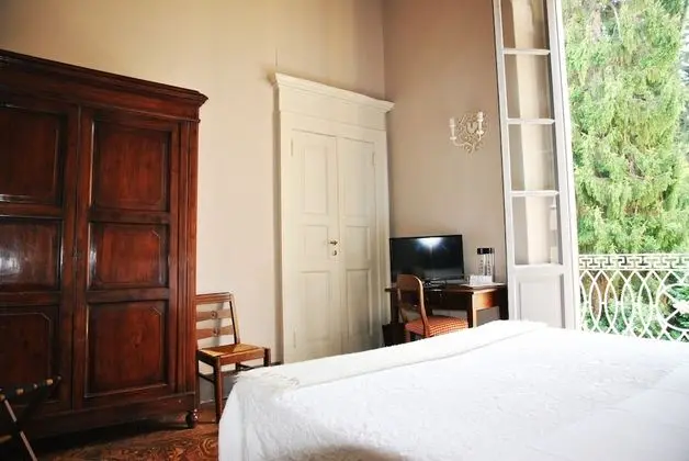 Tek Büyük veya İki Ayrı Yataklı Oda, Bahçe Manzaralı