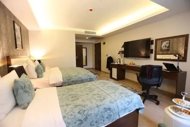 Üç Kişilik Oda