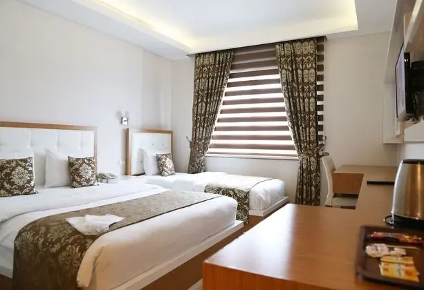 Üç Kişilik Oda