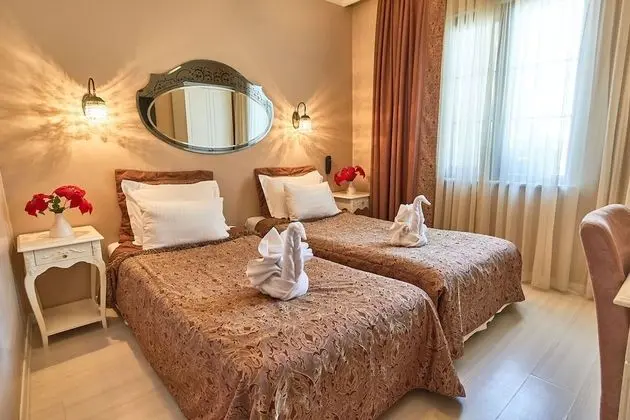 Deluxe Tek Büyük veya İki Ayrı Yataklı Oda