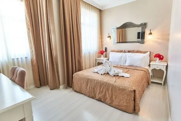 Deluxe Tek Büyük veya İki Ayrı Yataklı Oda