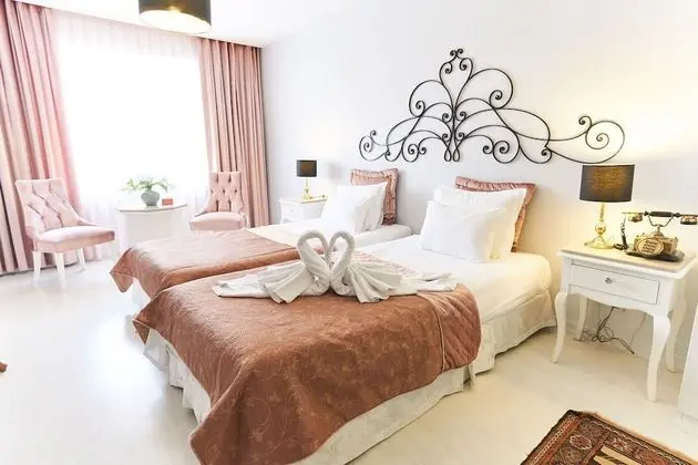Deluxe Tek Büyük veya İki Ayrı Yataklı Oda