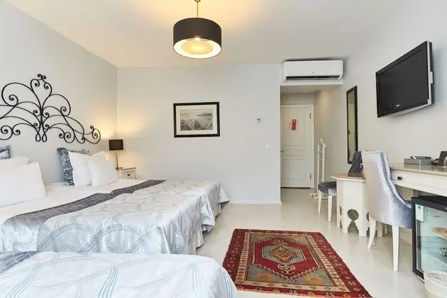 Deluxe Üç Kişilik Oda