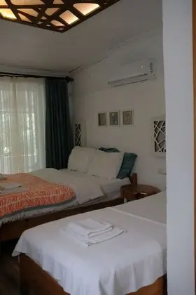 Üç Kişilik Oda