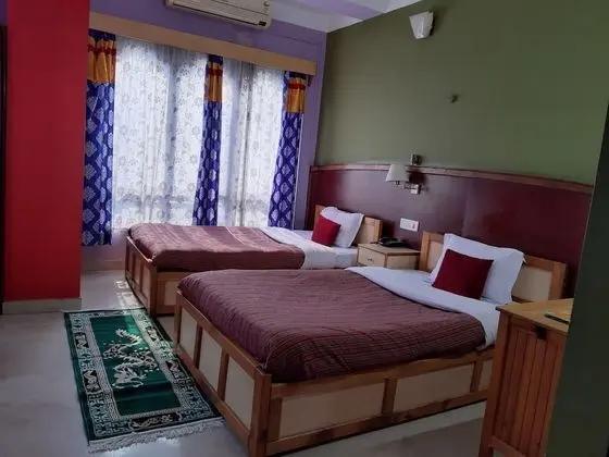 Deluxe Tek Büyük veya İki Ayrı Yataklı Oda