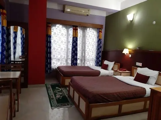Deluxe Tek Büyük veya İki Ayrı Yataklı Oda