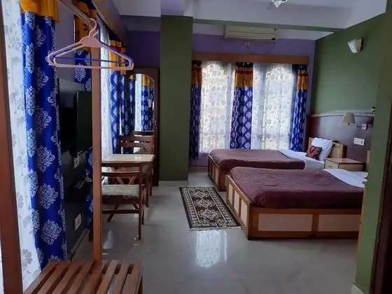 Deluxe Tek Büyük veya İki Ayrı Yataklı Oda
