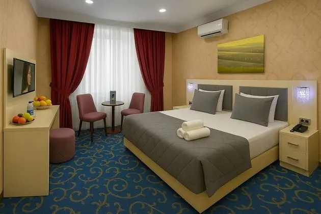 Deluxe Tek Büyük Yataklı Oda