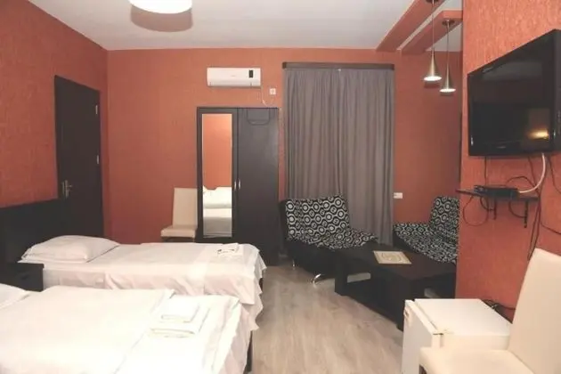 Deluxe Üç Kişilik Oda