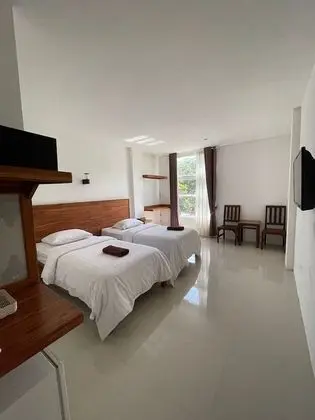Deluxe Tek Büyük veya İki Ayrı Yataklı Oda
