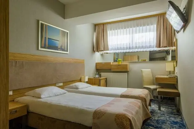 Economy Tek Büyük veya İki Ayrı Yataklı Oda (level - 1)