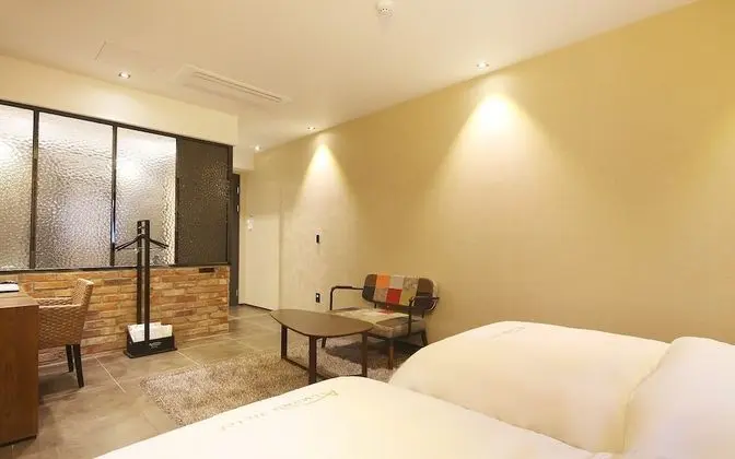 Oda (Deluxe twin (single + single free bre)