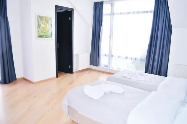Deluxe Tek Büyük veya İki Ayrı Yataklı Oda, Balkon