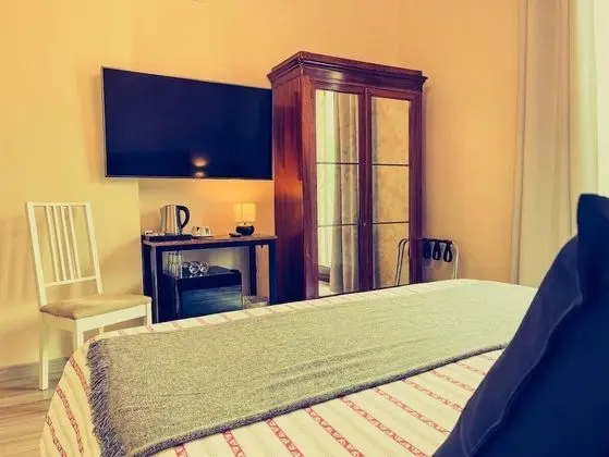 Tek Büyük veya İki Ayrı Yataklı Oda, Bahçe Manzaralı