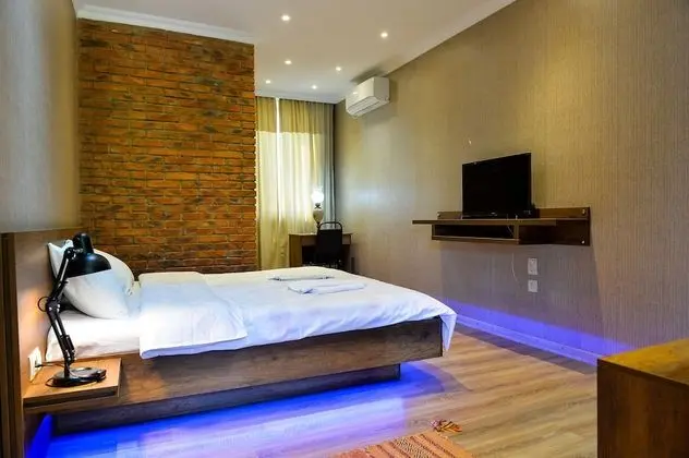 Deluxe Tek Büyük veya İki Ayrı Yataklı Oda