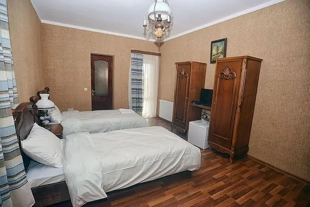 Deluxe Tek Büyük veya İki Ayrı Yataklı Oda