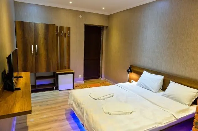 Deluxe Tek Büyük veya İki Ayrı Yataklı Oda