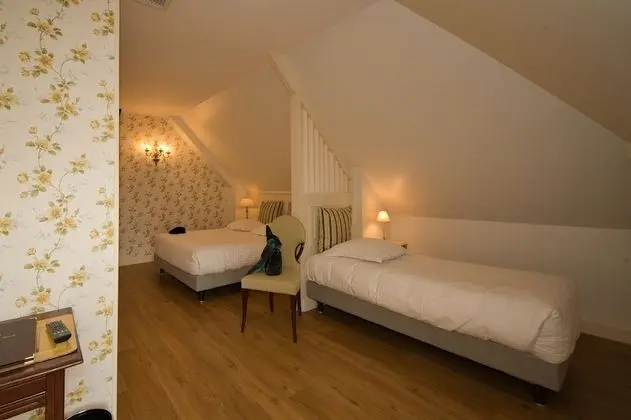 Premium Üç Kişilik Oda (Charming Attic)