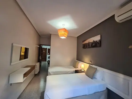 Basic Tek Büyük veya İki Ayrı Yataklı Oda