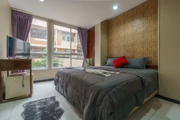 Deluxe Tek Büyük veya İki Ayrı Yataklı Oda