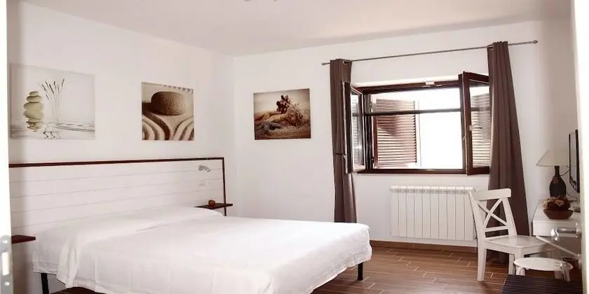 Deluxe Tek Büyük veya İki Ayrı Yataklı Oda