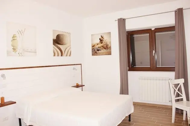 Deluxe Tek Büyük veya İki Ayrı Yataklı Oda