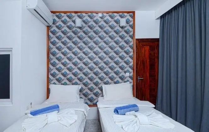 Deluxe Tek Büyük veya İki Ayrı Yataklı Oda