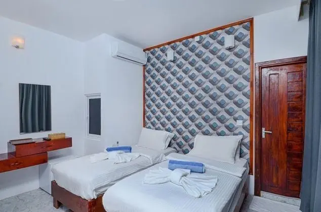 Deluxe Tek Büyük veya İki Ayrı Yataklı Oda