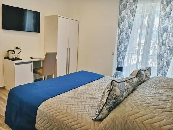 Deluxe Tek Büyük veya İki Ayrı Yataklı Oda