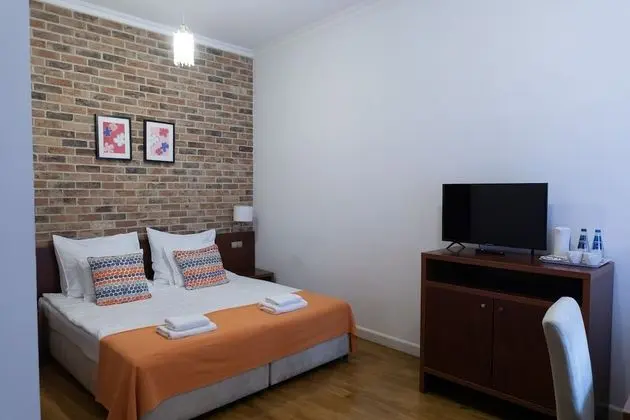 Deluxe Tek Büyük veya İki Ayrı Yataklı Oda