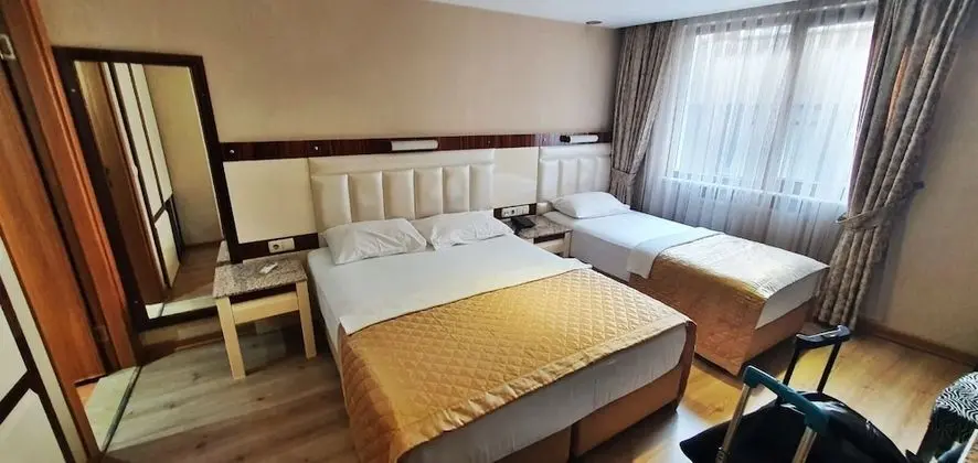 Üç Kişilik Oda