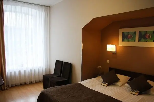 Tek Büyük veya İki Ayrı Yataklı Oda, Bahçe Manzaralı