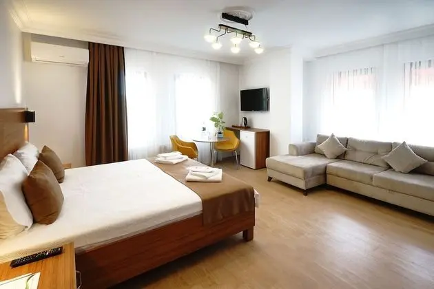 Deluxe Tek Büyük veya İki Ayrı Yataklı Oda