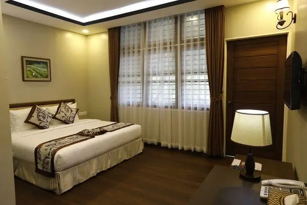 Deluxe Tek Büyük veya İki Ayrı Yataklı Oda