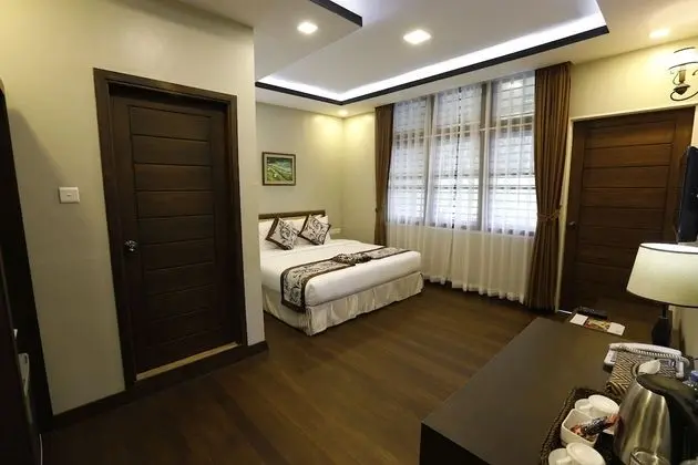 Deluxe Tek Büyük veya İki Ayrı Yataklı Oda