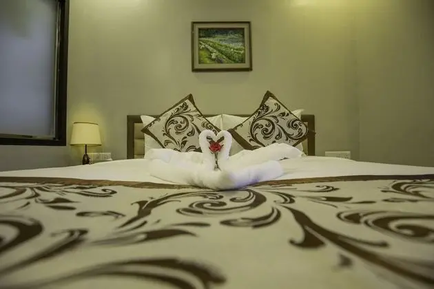 Deluxe Tek Büyük veya İki Ayrı Yataklı Oda