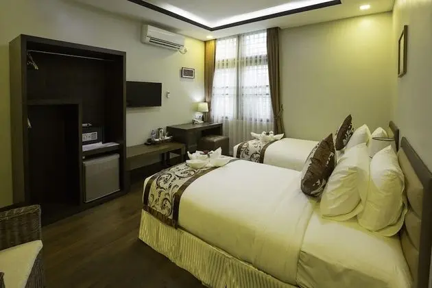 Deluxe Tek Büyük veya İki Ayrı Yataklı Oda