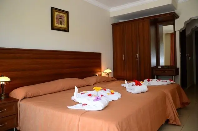 Üç Kişilik Oda, Bahçe Manzaralı
