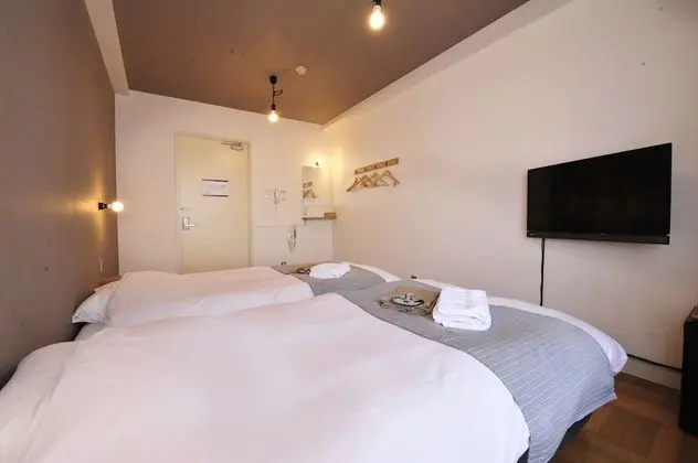 İki Ayrı Yataklı Oda (for 1 guest, shared bathroom)