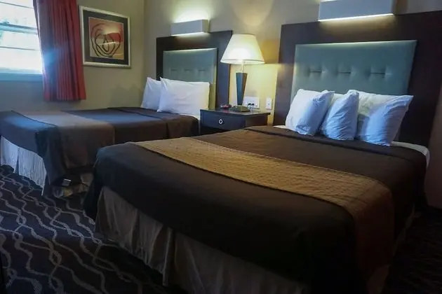 Deluxe Non Smoking 2 Double Beds Exterior Pool - Side Rooms