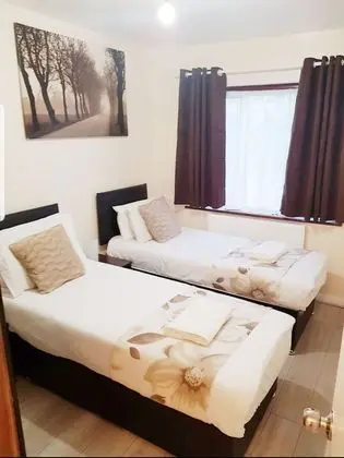 Deluxe Tek Büyük veya İki Ayrı Yataklı Oda, Ortak Banyo, Bahçe Manzaralı