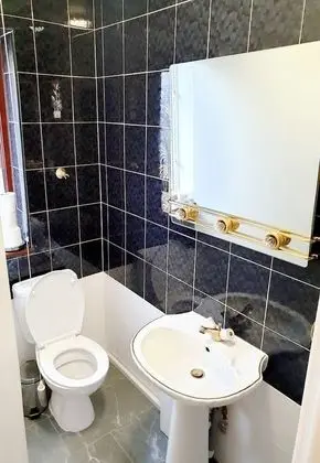 Deluxe Tek Büyük veya İki Ayrı Yataklı Oda, Ortak Banyo, Bahçe Manzaralı