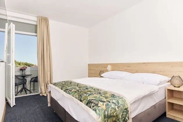 Tek Büyük veya İki Ayrı Yataklı Oda, Balkon, Deniz Manzaralı