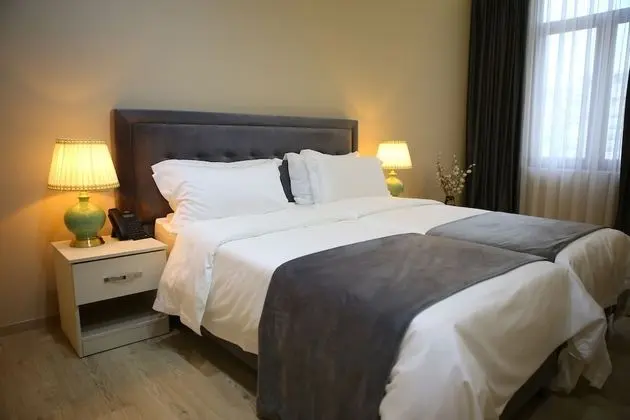 Deluxe Tek Büyük veya İki Ayrı Yataklı Oda