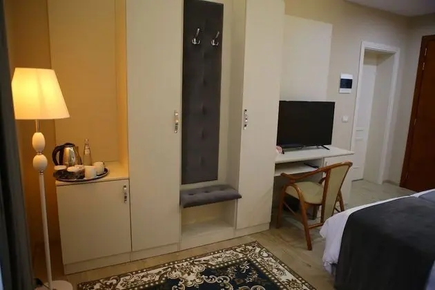 Deluxe Tek Büyük veya İki Ayrı Yataklı Oda