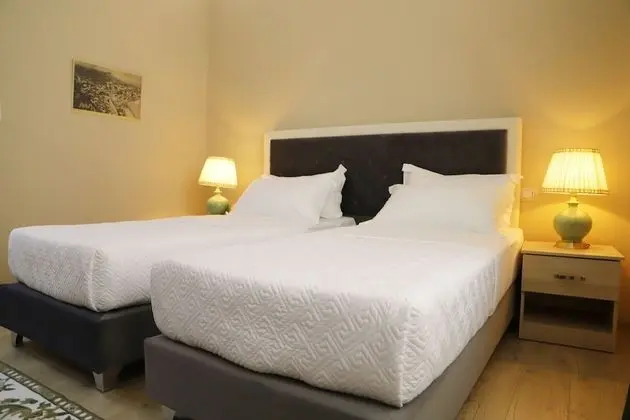 Deluxe Tek Büyük veya İki Ayrı Yataklı Oda